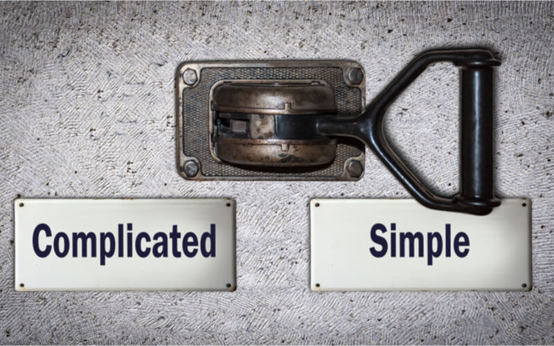 A switch depicting 2 sides of switch as complicated and simple